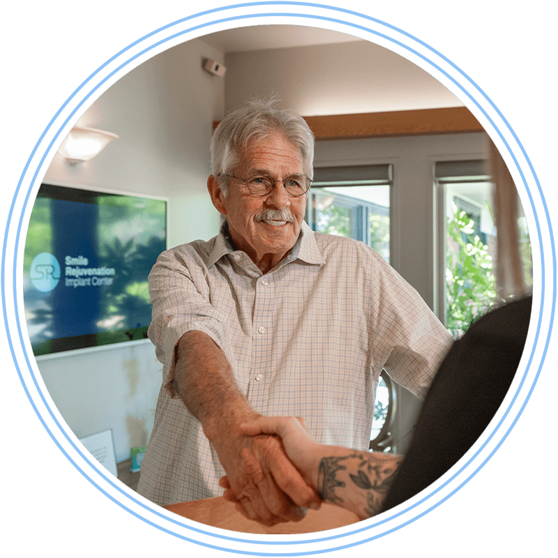 dental patient handshaking office manager